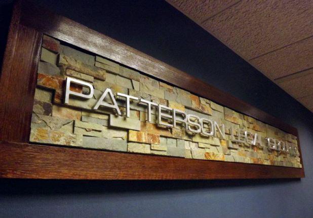 Gary Patterson designed the Patterson Legal Group sign that welcomes clients above the entry way door