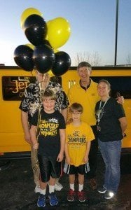 Patterson Legal Group and Jerseys Grill and Bar donate Shocker basketball package to Make a Wish child Kody